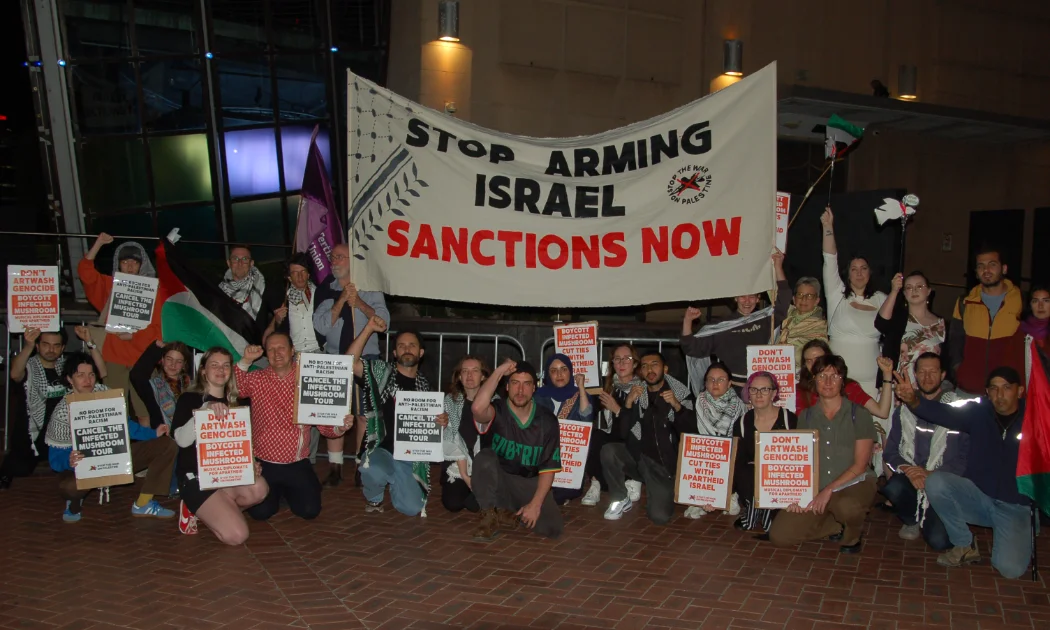 Protestors gather in Darling Harbour to call on Home the Venue to cancel Infected Mushroom's show