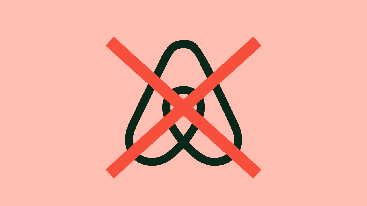 The Airbnb logo covered with a red cross